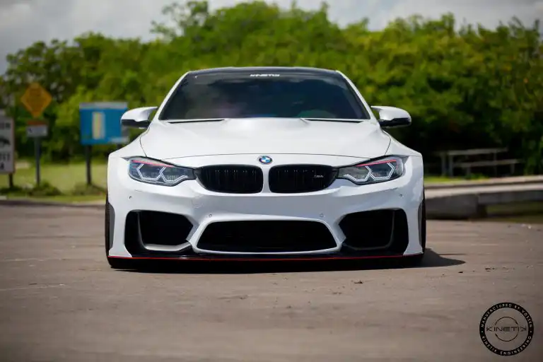 Alpine White Widebody BMW M4 Looks Great On Red Wheels