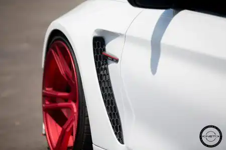 Alpine White Widebody BMW M4 Looks Great On Red Wheels