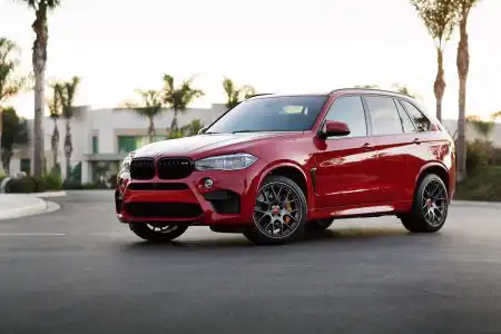 Melbourne Red Metallic BMW X5 M is done by Alex Stone Wallpaper