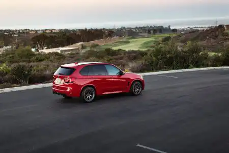 Melbourne Red Metallic BMW X5 M is done by Alex Stone Wallpaper