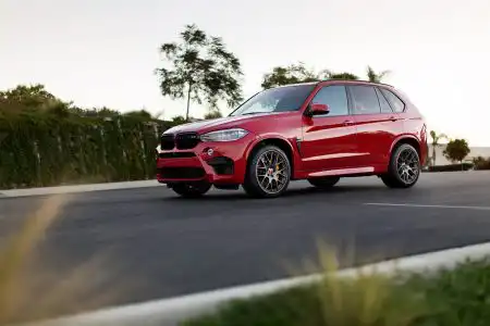Melbourne Red Metallic BMW X5 M is done by Alex Stone Wallpaper