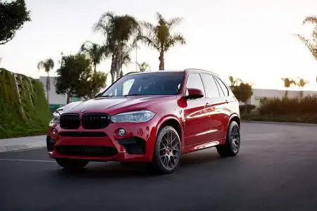 Melbourne Red Metallic BMW X5 M is done by Alex Stone Wallpaper