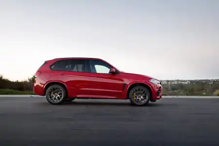 Melbourne Red Metallic BMW X5 M is done by Alex Stone Wallpaper