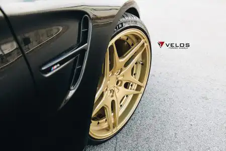 Black Sapphire Metallic BMW M4 On Gold Velos Designwerks Wheels Wallpaper