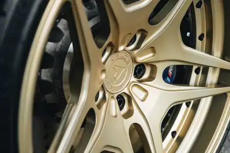 Black Sapphire Metallic BMW M4 On Gold Velos Designwerks Wheels Wallpaper