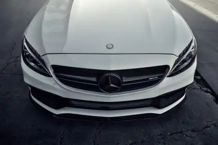 White Mercedes-Benz C63 AMG With Mode Carbon Aero Parts