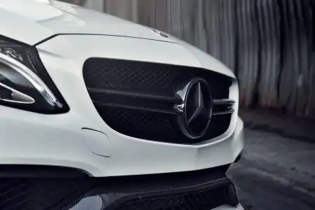 White Mercedes-Benz C63 AMG With Mode Carbon Aero Parts