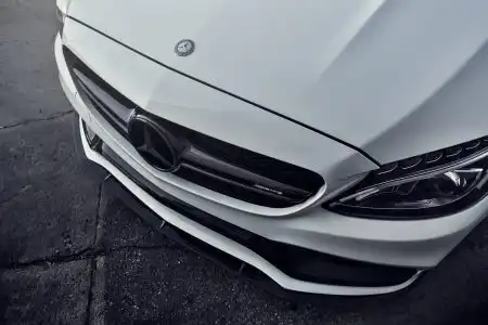White Mercedes-Benz C63 AMG With Mode Carbon Aero Parts