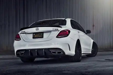 White Mercedes-Benz C63 AMG With Mode Carbon Aero Parts