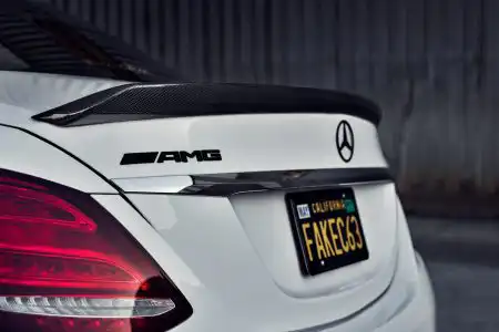 White Mercedes-Benz C63 AMG With Mode Carbon Aero Parts