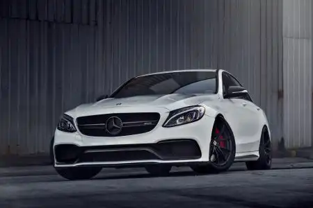 White Mercedes-Benz C63 AMG With Mode Carbon Aero Parts