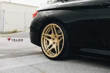 Black Sapphire Metallic BMW M4 On Gold Velos Designwerks Wheels Wallpaper