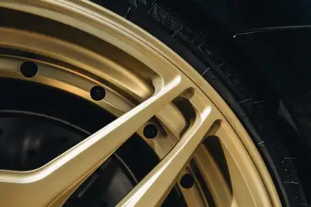Black Sapphire Metallic BMW M4 On Gold Velos Designwerks Wheels Wallpaper