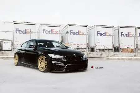 Black Sapphire Metallic BMW M4 On Gold Velos Designwerks Wheels Wallpaper