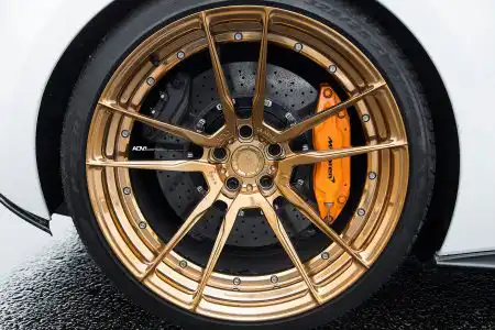silica-white-mclaren-570s-coupe-aftermarket-parts-adv1-wheels-bronze-gold-g