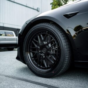 Solid Black Model S Plaid With - Unplugged Performance Big Brake Kit (BBK)