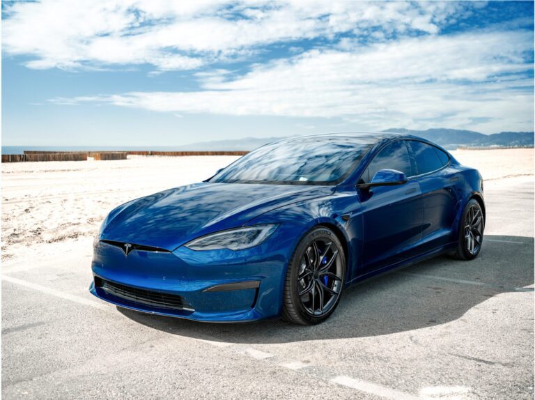 Blue Metallic Tesla Model S Plaid With UP x KAM Carbon Fiber Spoiler and BBK Kit