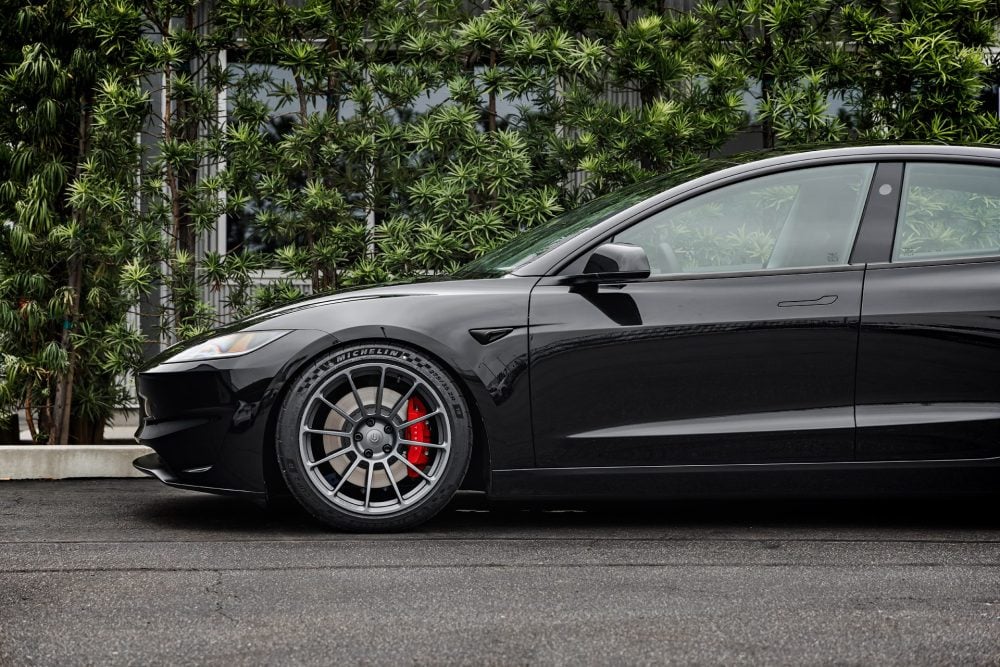 Solid Black 2024+ Tesla Model 3 Performance on UP-03 Wheels 6 Solid Black 2024+ Tesla Model 3 Performance on UP-03 Wheels