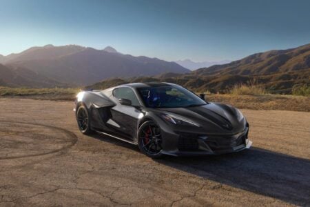 2027 Chevrolet Corvette Grand Sport X in Pitch Gray Metallic showcases an aggressive stance.