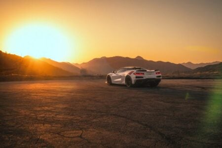 A wide rear view of the 2027 Corvette Grand Sport Launch Edition in Arctic White.
