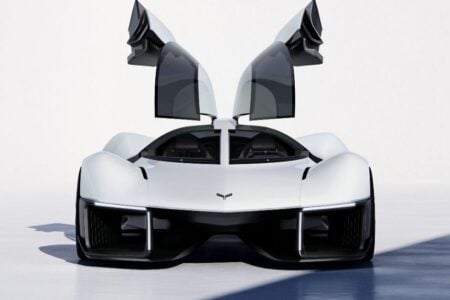 New Chevrolet Corvette concept car with open gull wing doors.